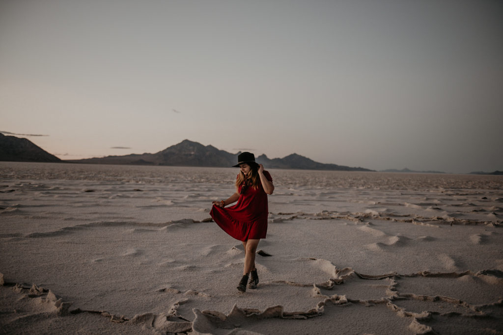 Girl standing at the Salt flats in the Utah