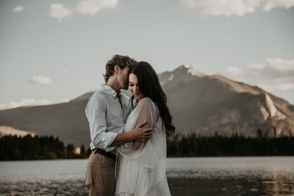 bride and groom hugging taken during an elopement at Lake Dillon in Colorado