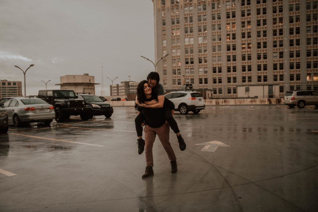photo of the girl giving her girlfriend a piggyback ride taken at the rooftop in Atlanta