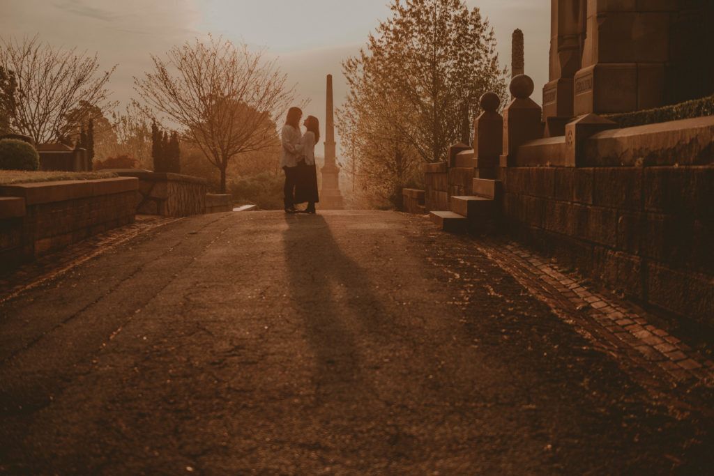 photo of the couple taken at oakland cemetery at sunrise in atlanta
