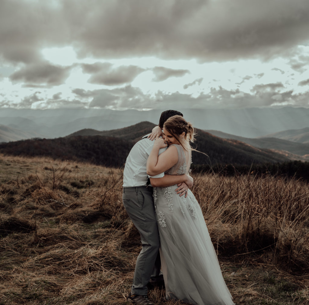bride and groom hugging during their elopement in north carolina