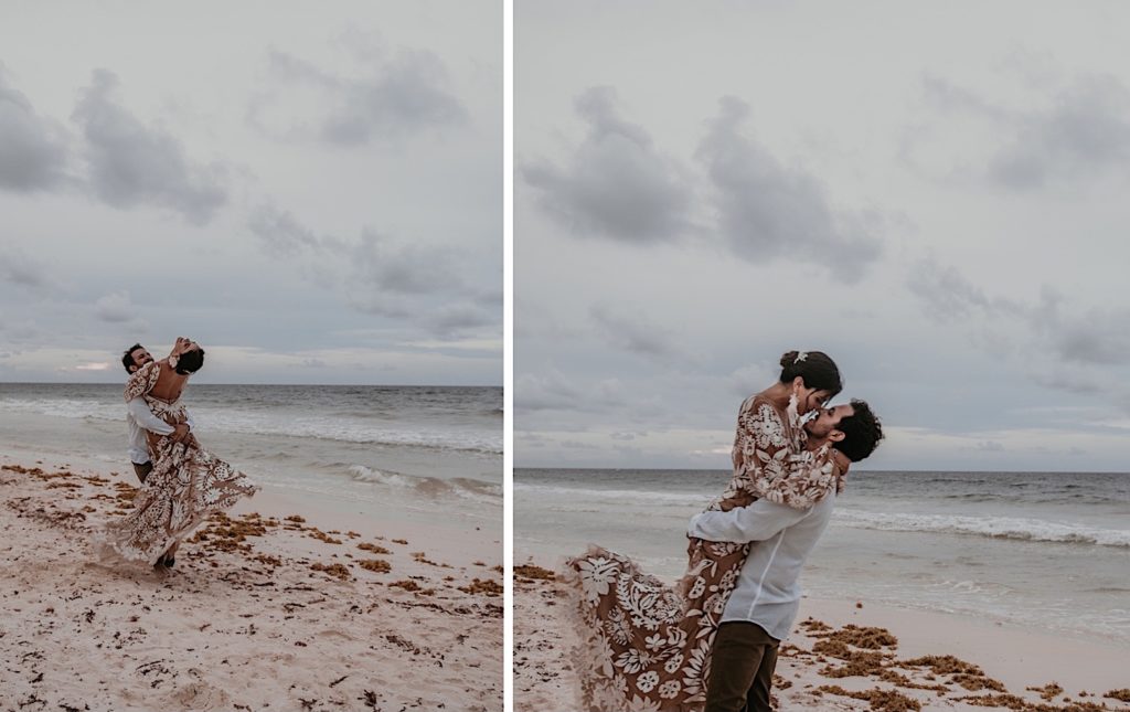 Photo of the groom picking up the bride and twirling her on the beach taken at an elopement in Tulum Mexico