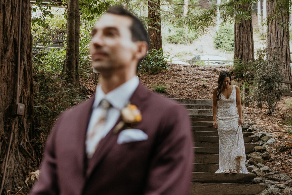 Bride and grooms first looks from a fall redwood forest California wedding at Kennolyn Camps