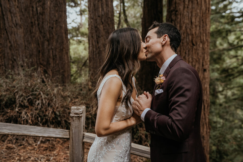Bride and grooms first looks from a fall redwood forest California wedding at Kennolyn Camps