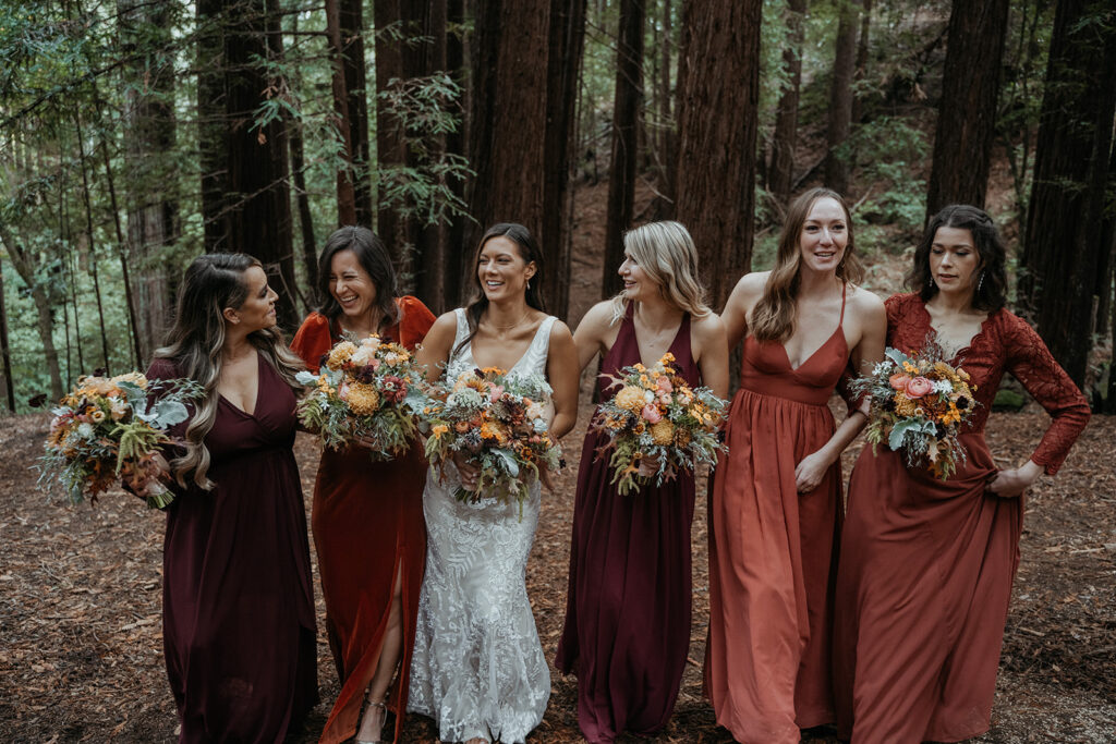 Bride and bridesmaids photos from a fall redwood forest California wedding at Kennolyn Camps