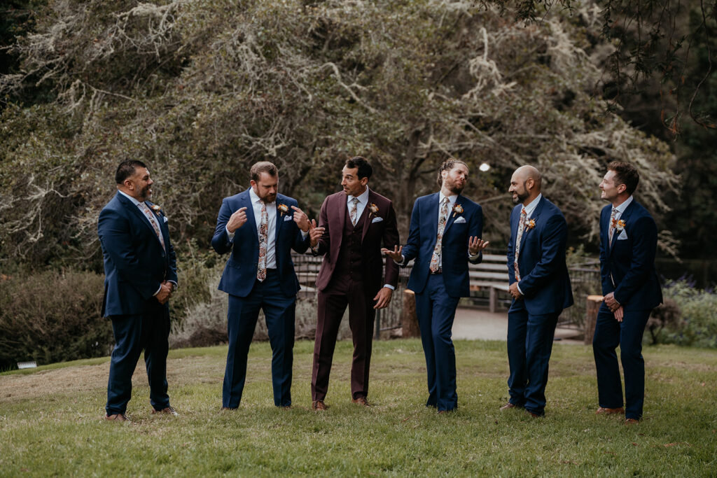 Groom and groomsmen photos from a fall redwood forest California wedding at Kennolyn Camps