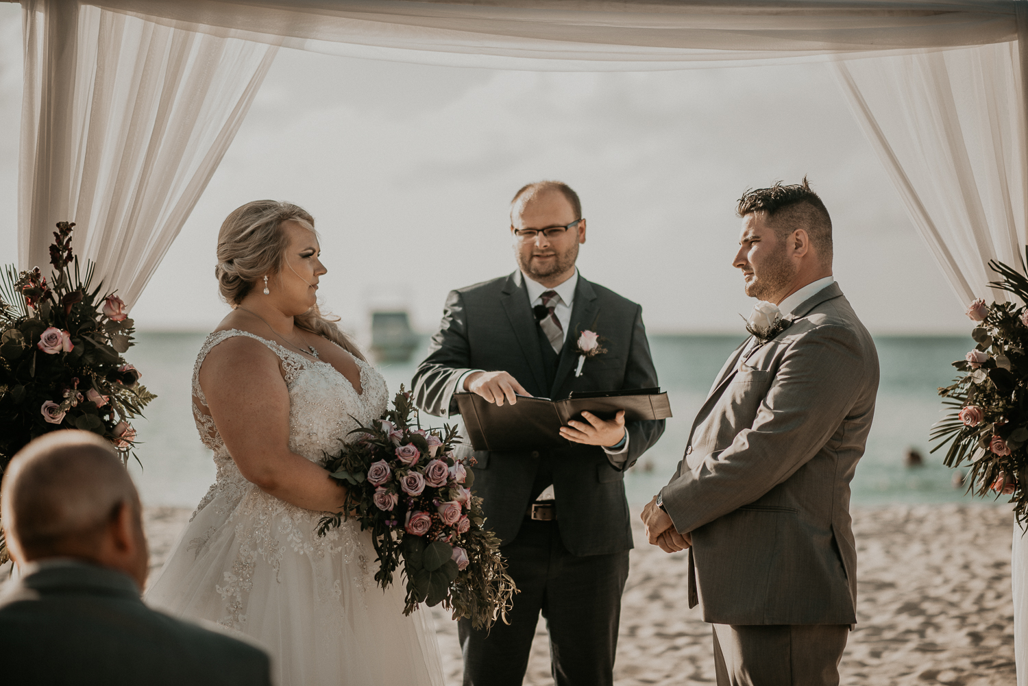 Beach wedding ceremony from a destination Aruba elopement wedding at Riu Palace