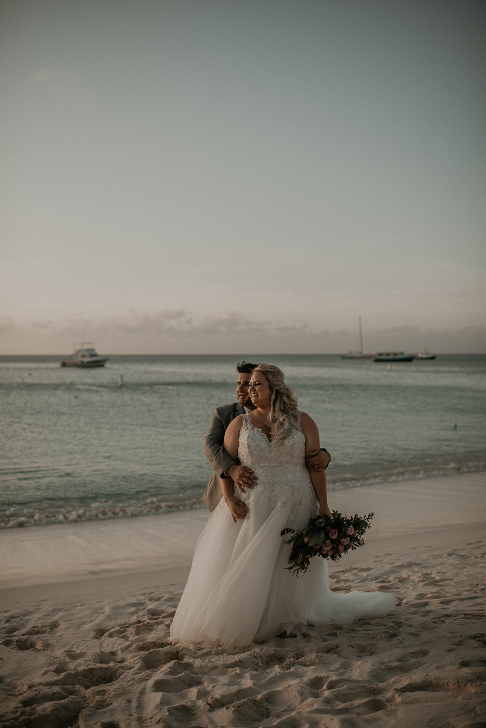 Bride and groom portraits from a destination Aruba elopement wedding at Riu Palace