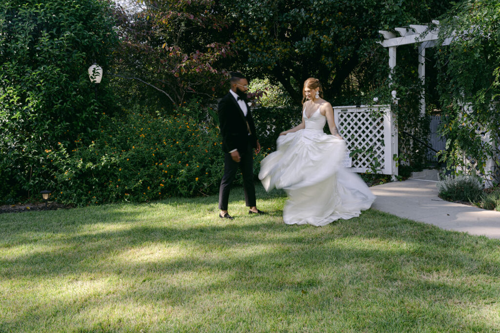 Bride and groom on the lawn of The Wildflower 301 wedding venue - Garden wedding venues in Georgia