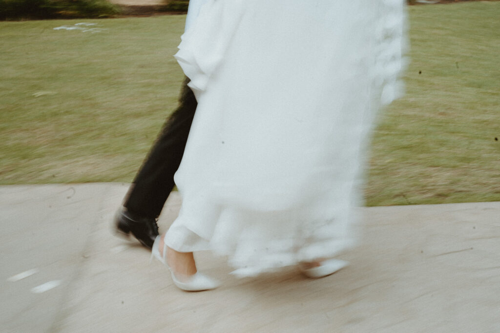 Blurry photos of bride and groom walking