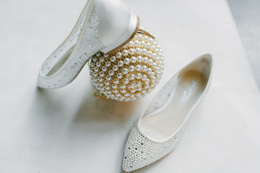 Brides wedding detail shot with her sparkly wedding flats. 