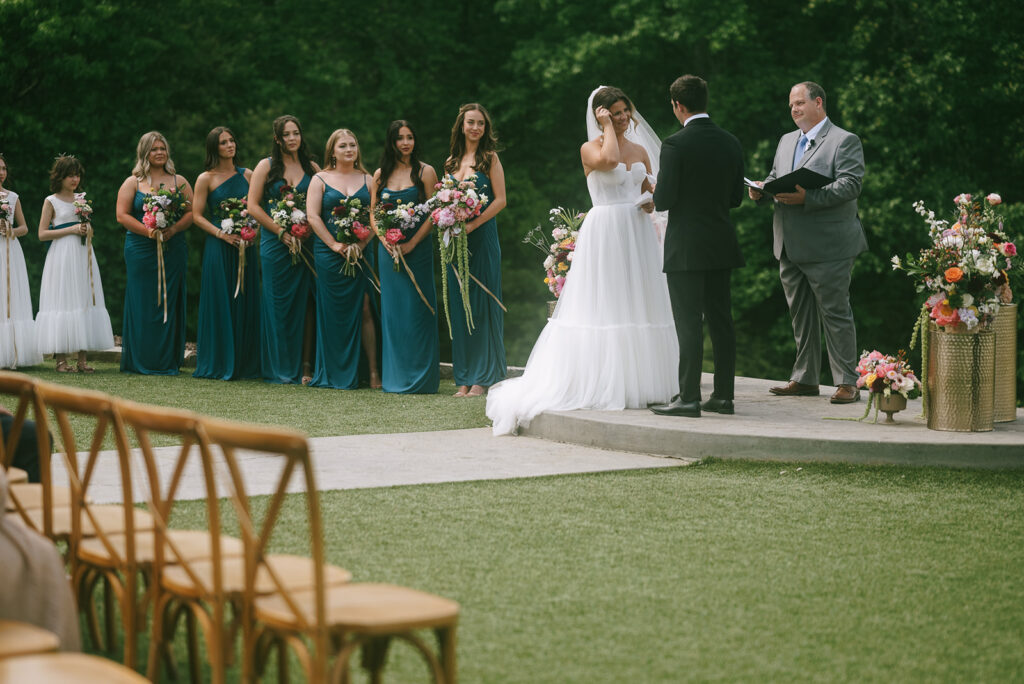 An outdoor spring Meadows at Mossy Creek wedding ceremony in Cleveland, Georgia