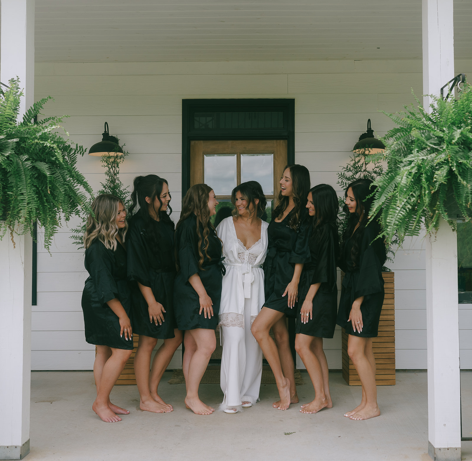 Bride and her bridesmaids in their getting ready attire