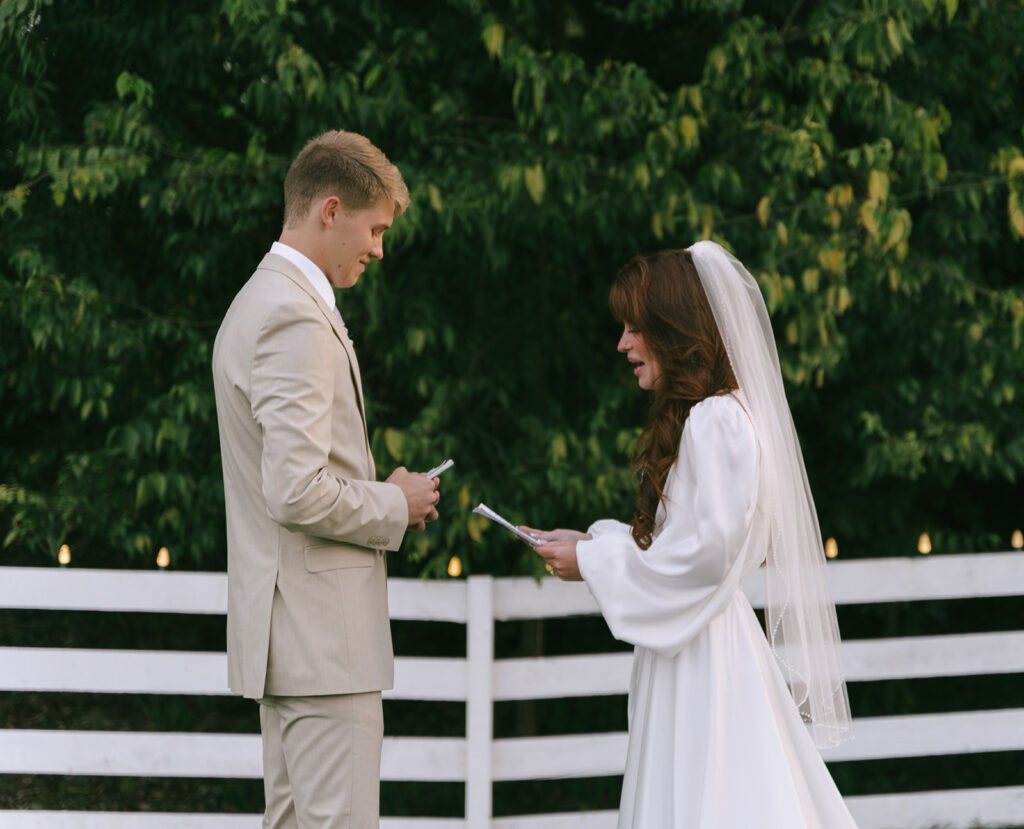 Bride and groom exchanging their private vows to one another. - Planning The Perfect Wedding Photography Timeline