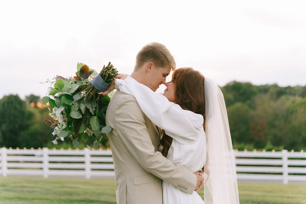 Image of a bride and groom embracing each other during their Nashville, Tennessee wedding.