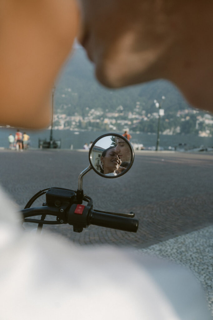 Photo of a bride and groom on a vespa