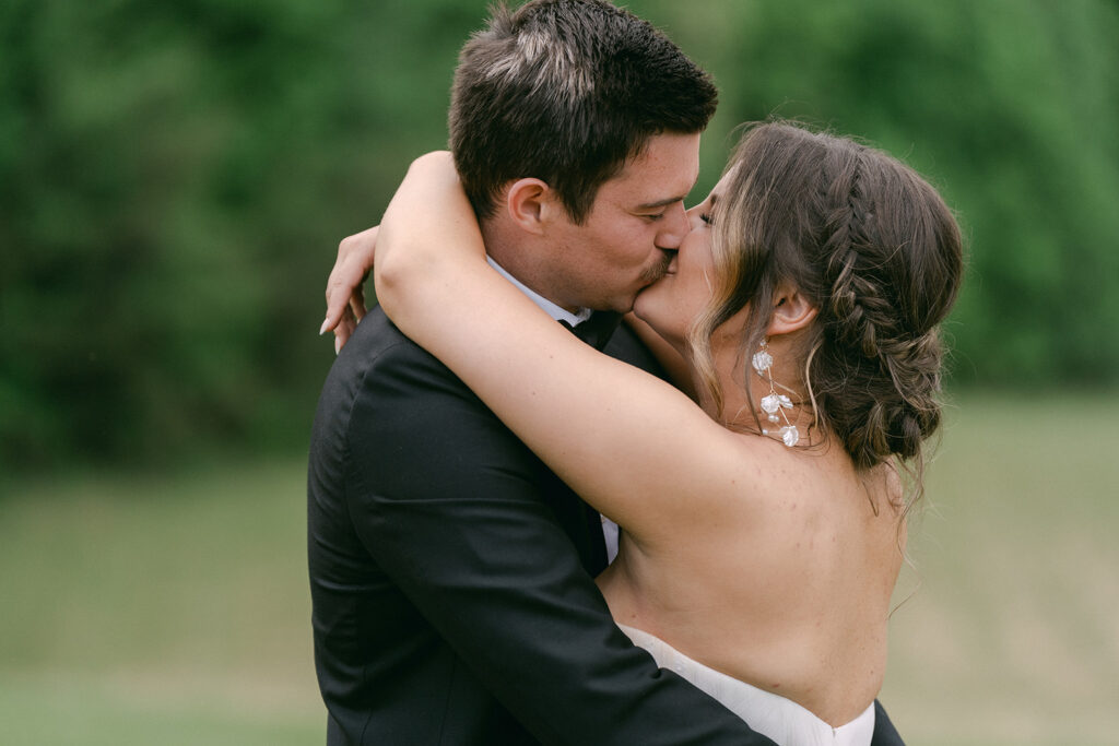 portrait of the bride kissing