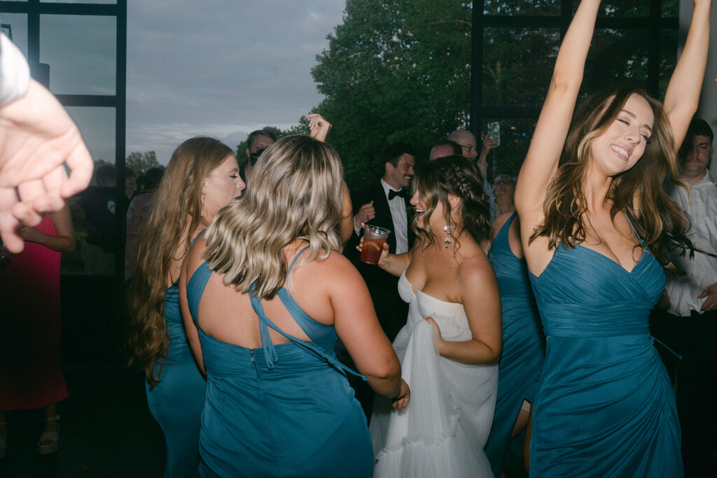 bride and her friends dancing