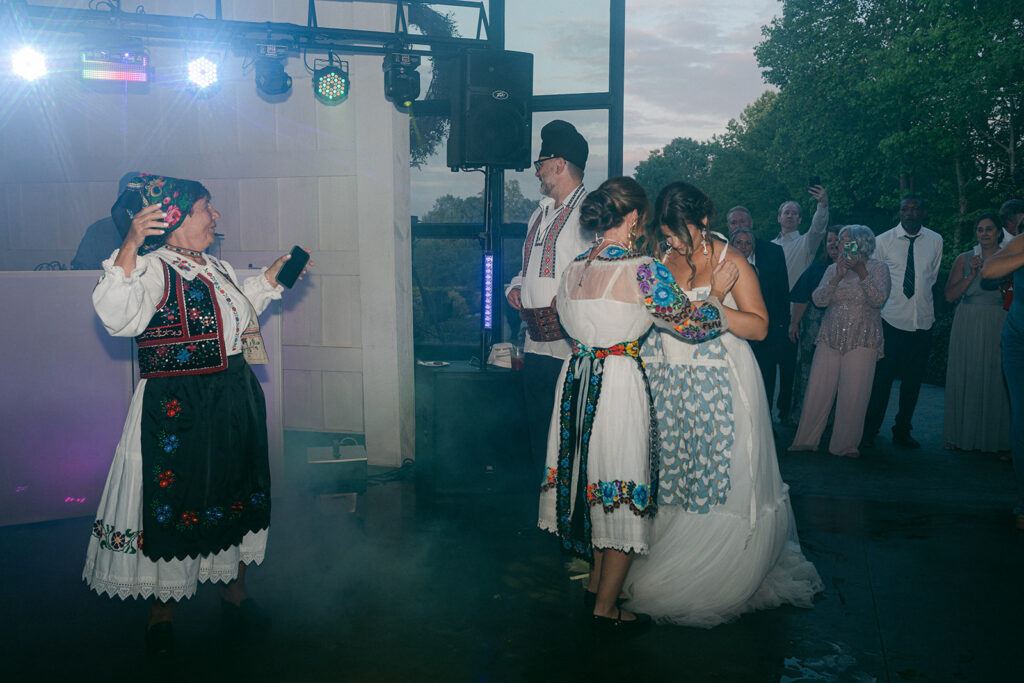 traditional romenian dance at the ethereal wedding reception