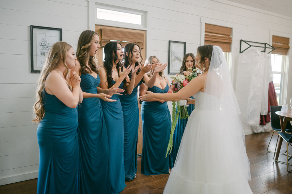 bride and bridesmaids first look