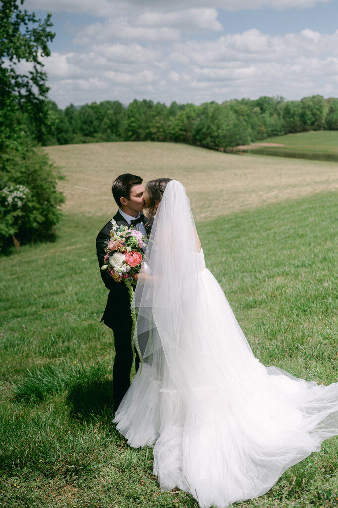 bride and groom kissing