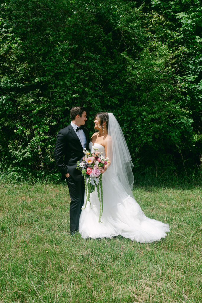 bride and groom looking at each other at their ethereal wedding