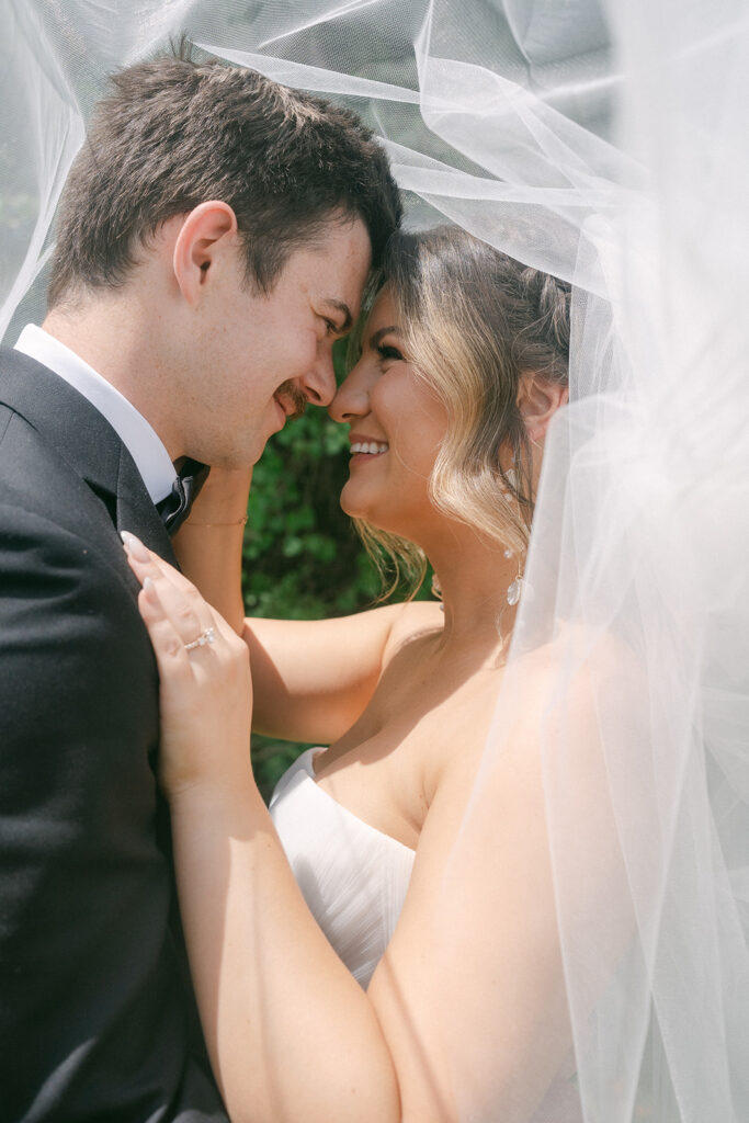 bride and groom looking at each other