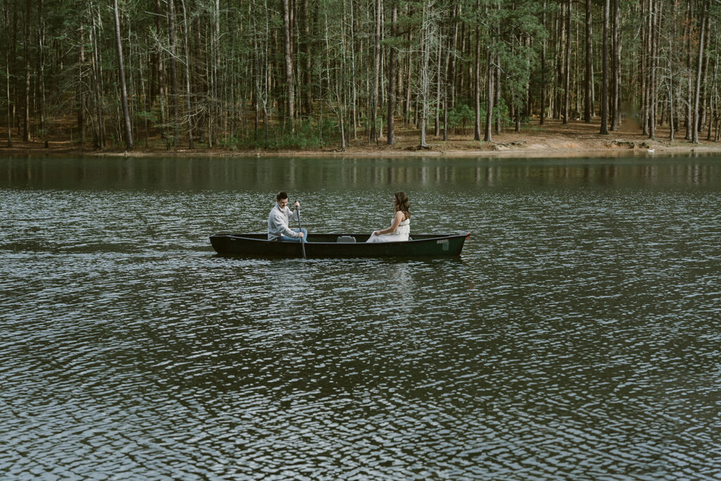 newly engaged couple canoeing at lake allatoona