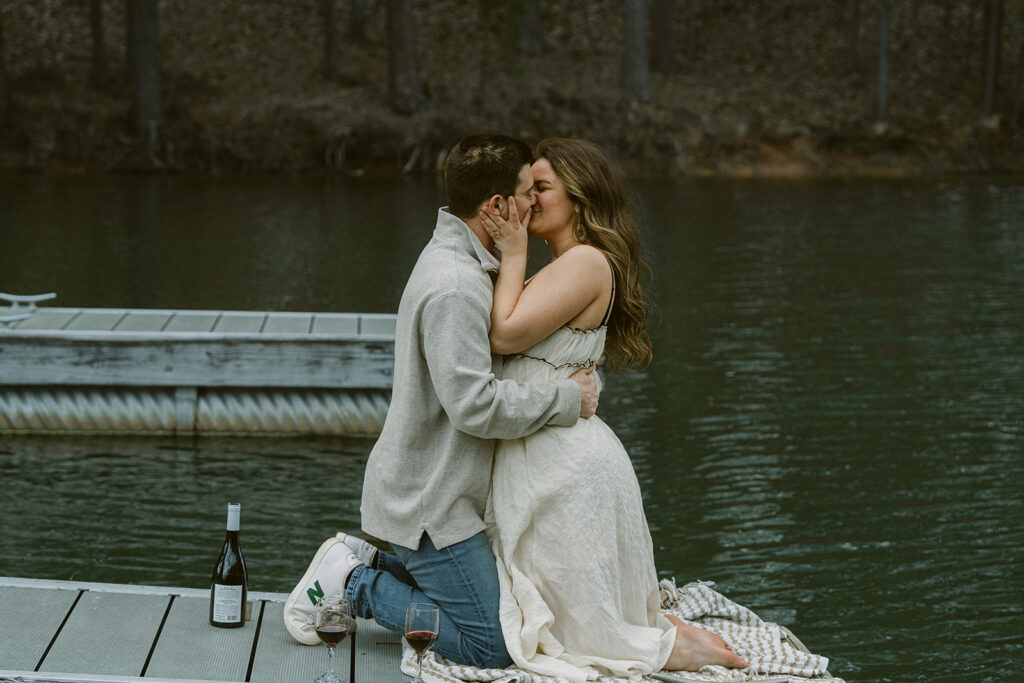 couple kissing during their unique engagement photos