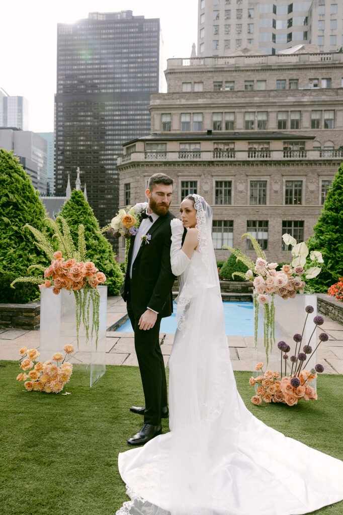 bride and groom hugging