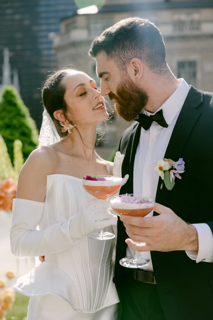 bride and groom drinking at their wedding reception