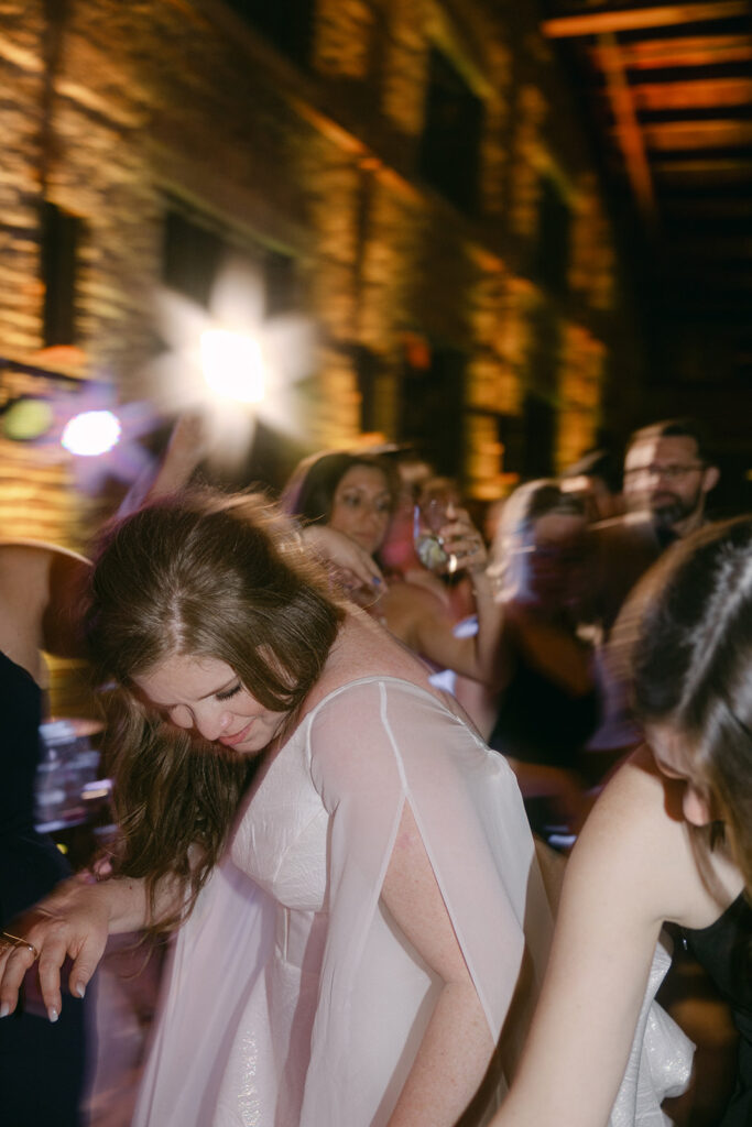 bride having fun at her wedding reception