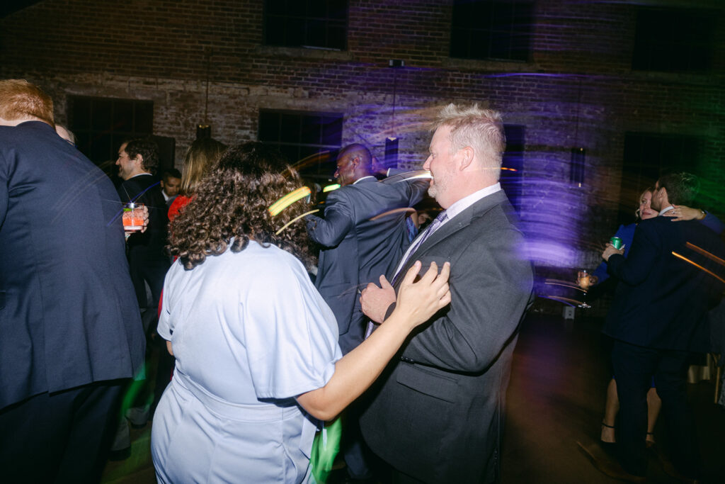 guests dancing at the wedding reception