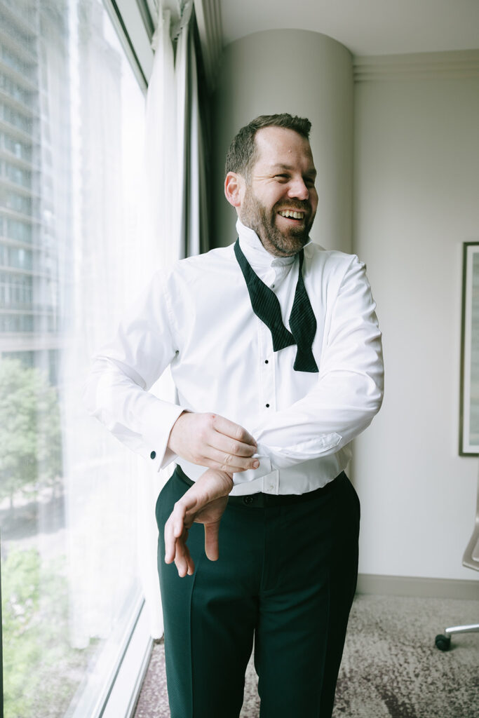 groom getting ready for his wedding ceremony 