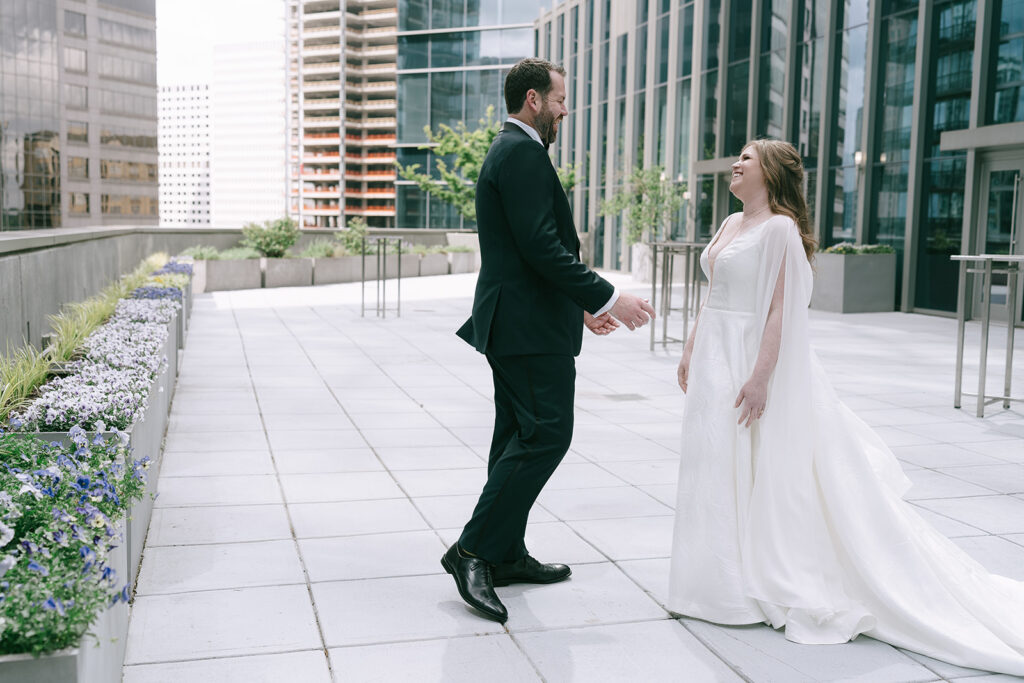 groom emotional seeing the bride in her wedding dress