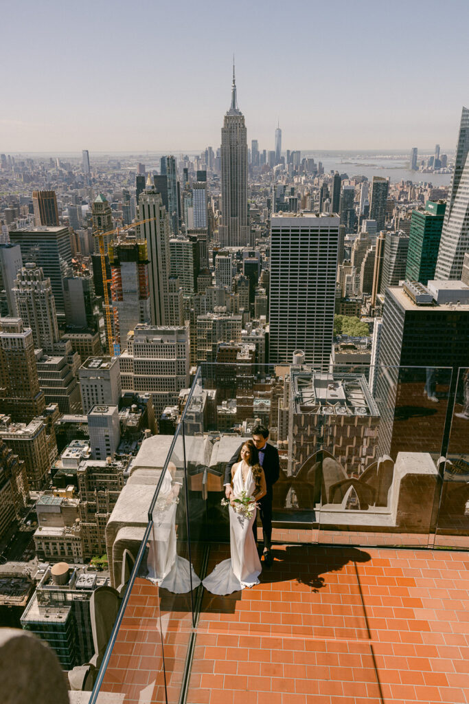 couple at the top of the rock in new york