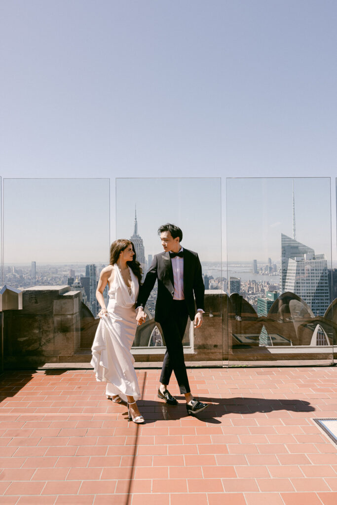 newly engaged couple hugging during their engagement photoshoot in new york