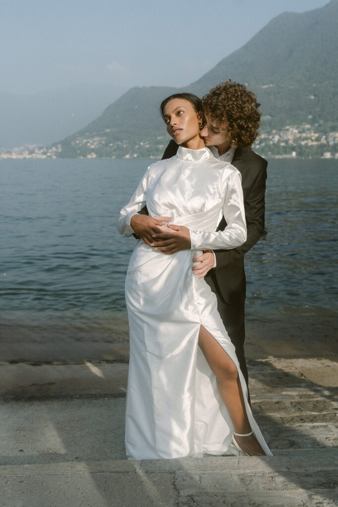 bride and groom hugging during their photoshoot in lake como