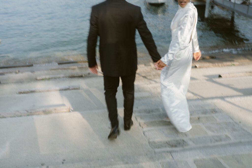 couple walking around lake como