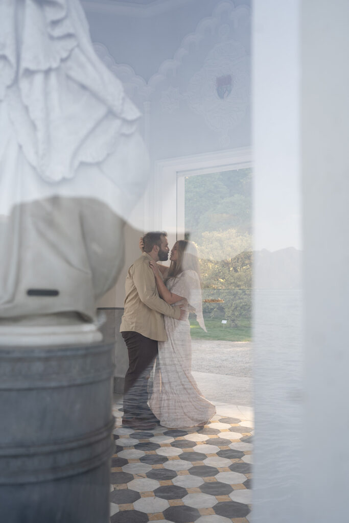 cute couple kissing during their photoshoot