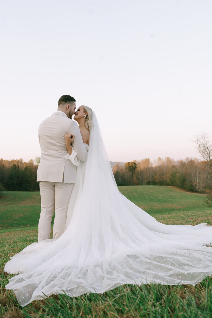 bride and groom hugging