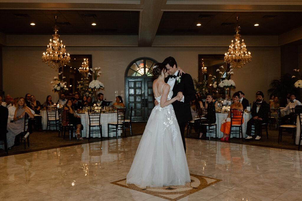 bride and groom dancing at their wedding reception