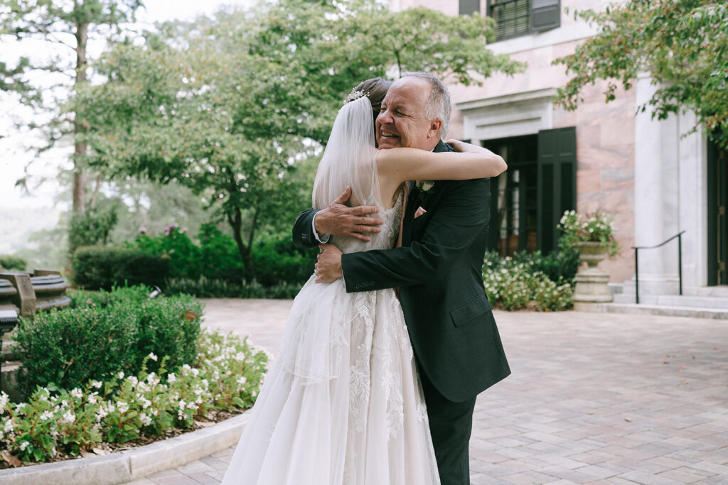 bride and her dad hugging