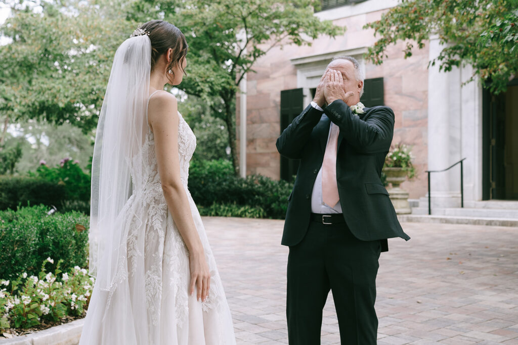 father of the bride emotional seeing the bride in her wedding dress