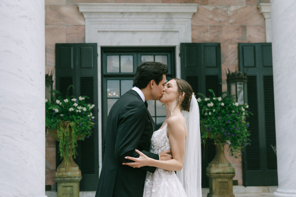 picture of the bride and groom kissing