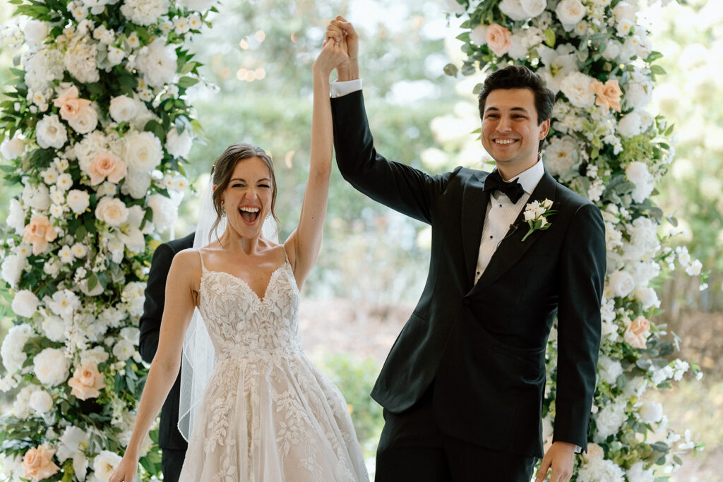 bride and groom heading to their wedding reception