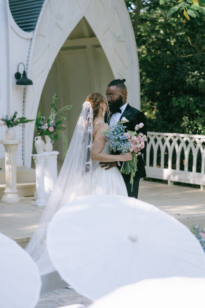 bride and groom looking at each other