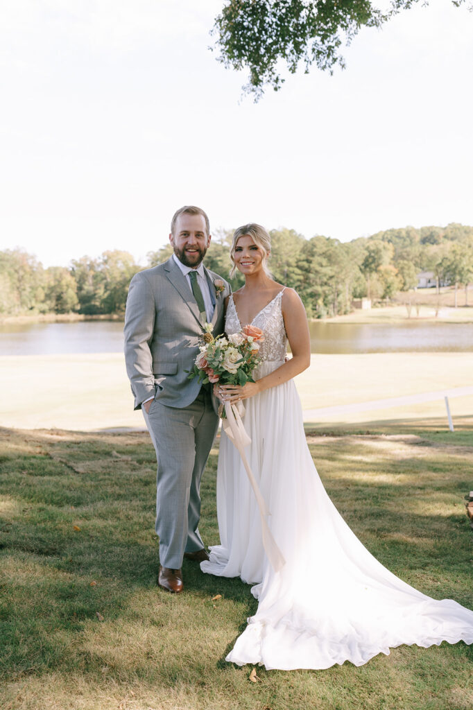 bride and groom looking at the camera