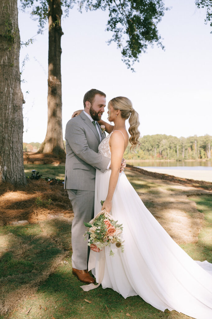 picture of the bride and groom looking at each other 