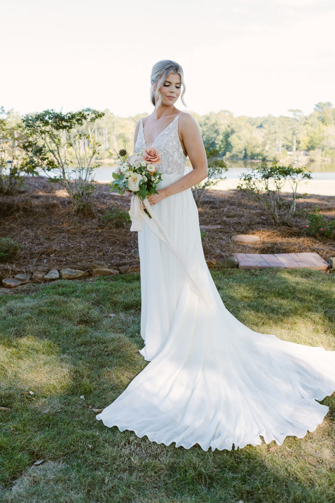 bride at her lake house wedding 